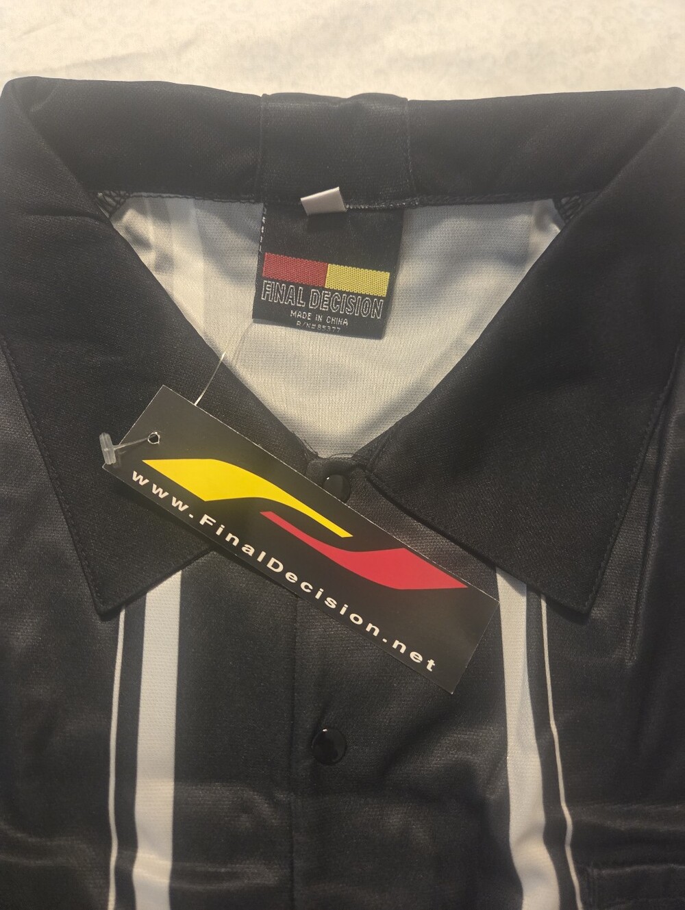 Men’s Black Polo with White Stripe Accents